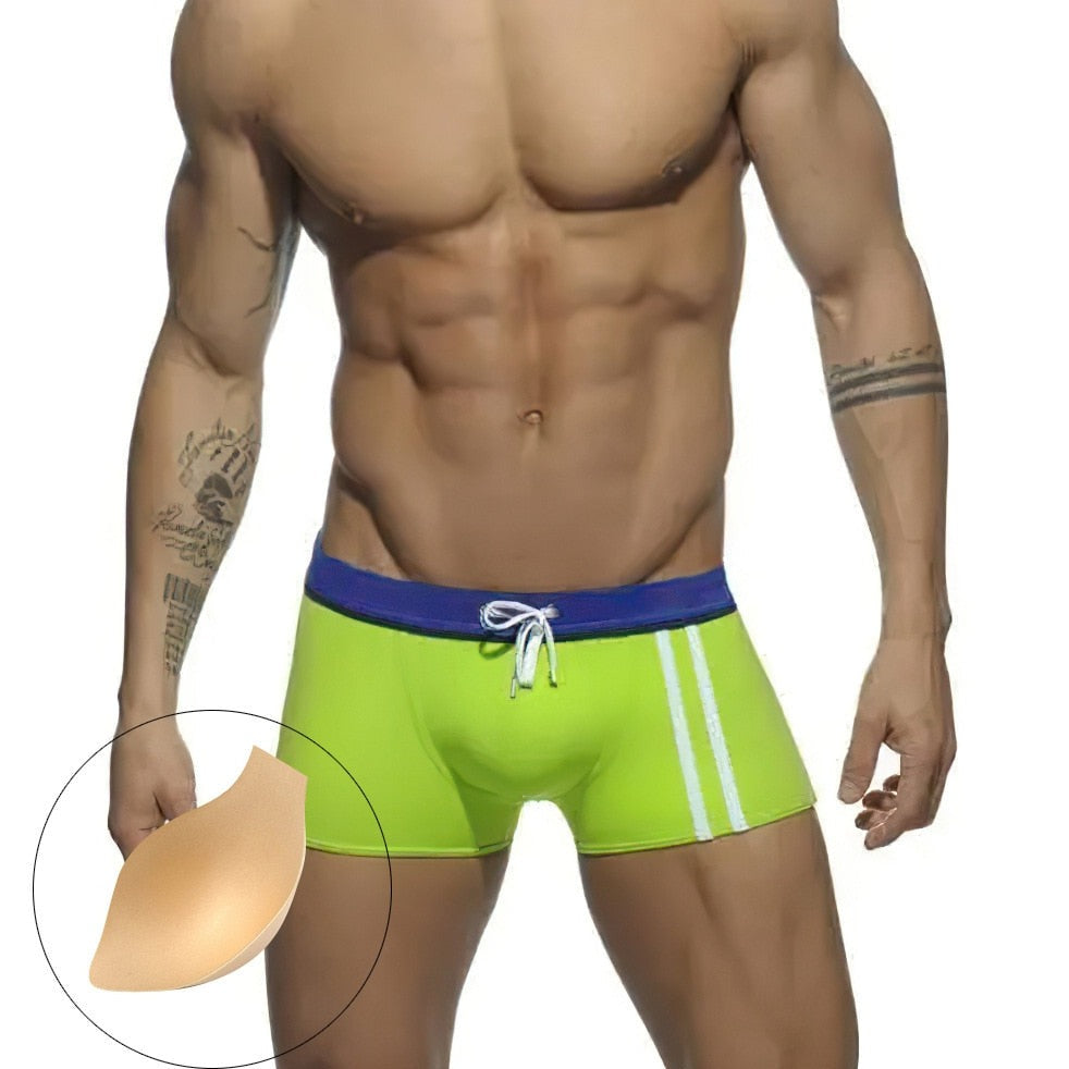 hot gay man in green Gay Swimwear | Men's Square Cut Racing Stripe Swim Trunks - pridevoyageshop.com - gay men’s underwear and swimwear