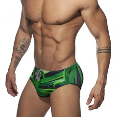 a hot gay man in Men's Green Leaf Swim Briefs - pridevoyageshop.com - gay men’s underwear and swimwear