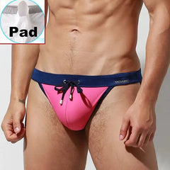 a sexy gay man in pink Desmiit Bowtie High Leg Swim Briefs - pridevoyageshop.com - gay men’s underwear and swimwear