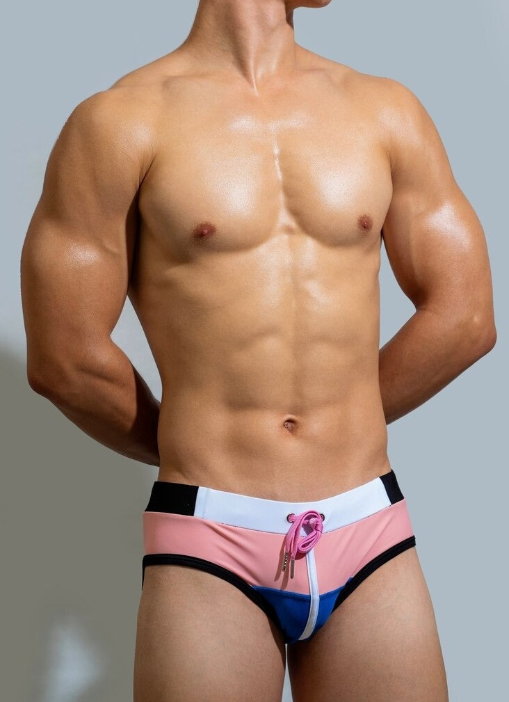 sexy gay man in pink Gay Swimwear | DM Laced Swim Briefs- pridevoyageshop.com - gay men’s underwear and swimwear