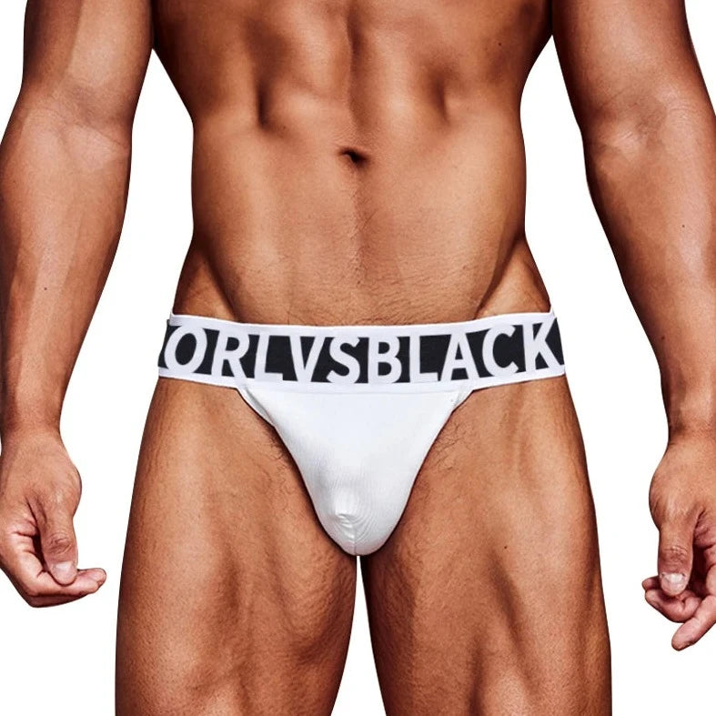 a hot gay man in white ORLVS Bold Jockstrap - pridevoyageshop.com - gay men’s underwear and swimwear