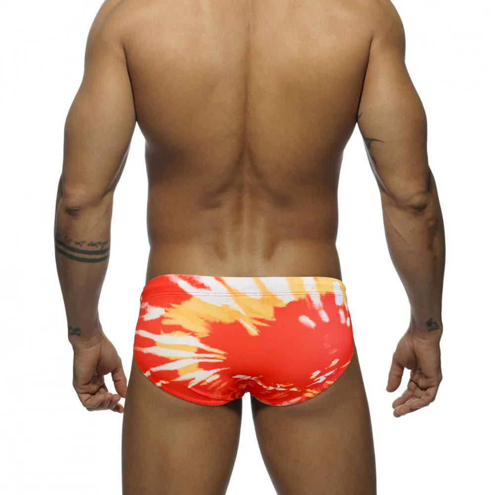 a hot gay man in Men's Fire Graffiti Swim Briefs - pridevoyageshop.com - gay men’s underwear and swimwear