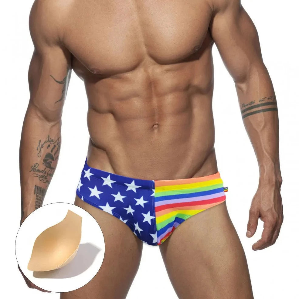 a hot gay man in Men's Patriotic Rainbow Swim Briefs - pridevoyageshop.com - gay men’s underwear and swimwear