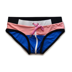 pink Gay Swimwear | DM Laced Swim Briefs- pridevoyageshop.com - gay men’s underwear and swimwear