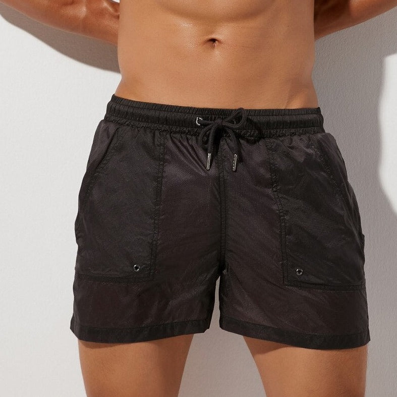 sexy gay man in black Gay Swimwear & Beachwear | Men's Transparent Swim Trunks - pridevoyageshop.com - gay men’s underwear and swimwear