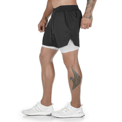 a muscle guy in black and white Men's Double Layered Hidden Pocket Workout Shorts - pridevoyageshop.com - gay men’s underwear and swimwear