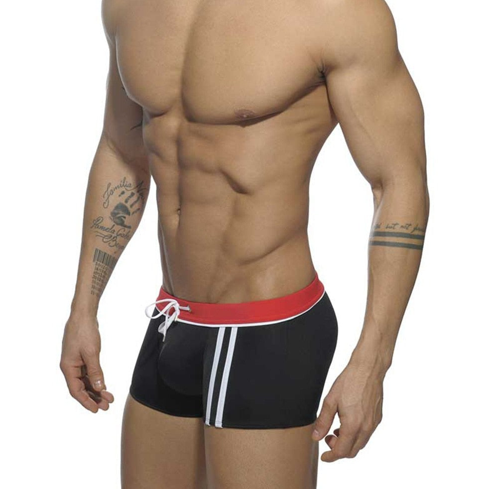 hot gay man in black Gay Swimwear | Men's Square Cut Racing Stripe Swim Trunks - pridevoyageshop.com - gay men’s underwear and swimwear