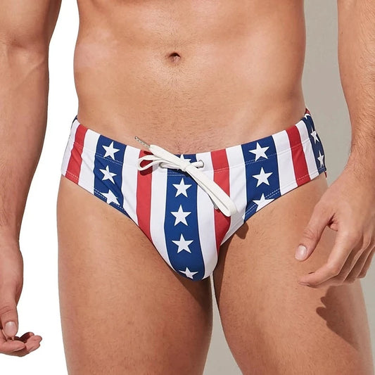 a hot gay man in Men's Patriotic Striped Swim Briefs - pridevoyageshop.com - gay men’s underwear and swimwear