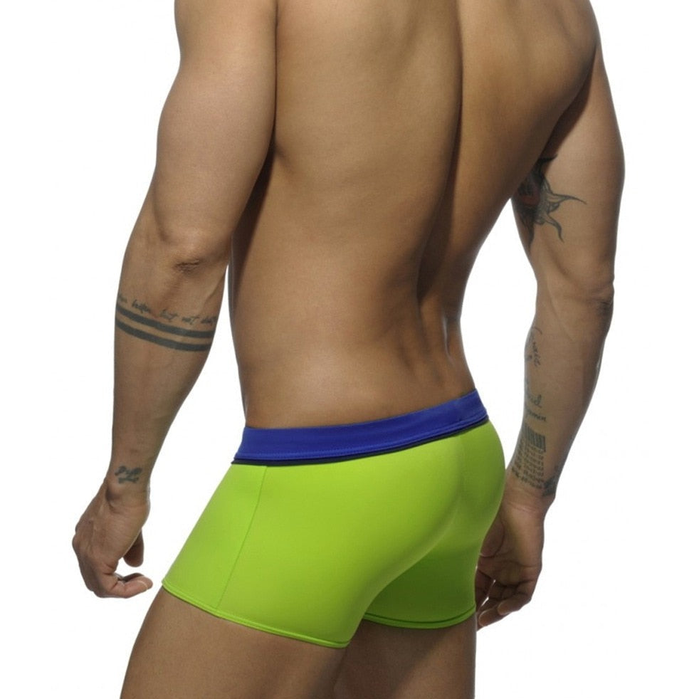 hot gay man in green Gay Swimwear | Men's Square Cut Racing Stripe Swim Trunks - pridevoyageshop.com - gay men’s underwear and swimwear