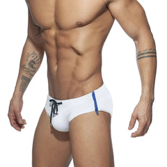a sexy gay man in white Men's Zipper Swim Briefs - pridevoyageshop.com - gay men’s underwear and swimwear