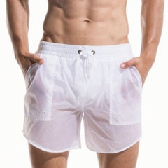 hot gay man in white Gay Swimwear & Beachwear | Desmiit See Through Board Shorts - pridevoyageshop.com - gay men’s underwear and swimwear