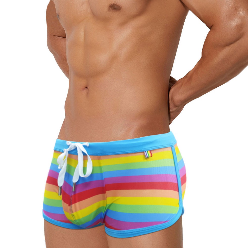 hot gay man in Gay Swimwear | Gay Men's Rainbow Drawstring Swim Trunks - pridevoyageshop.com - gay men’s underwear and swimwear