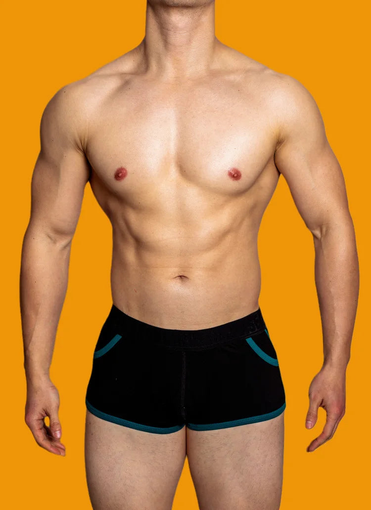 a sexy gay man in black DM Porn Star Pride Boxer Briefs - pridevoyageshop.com - gay men’s underwear and swimwear
