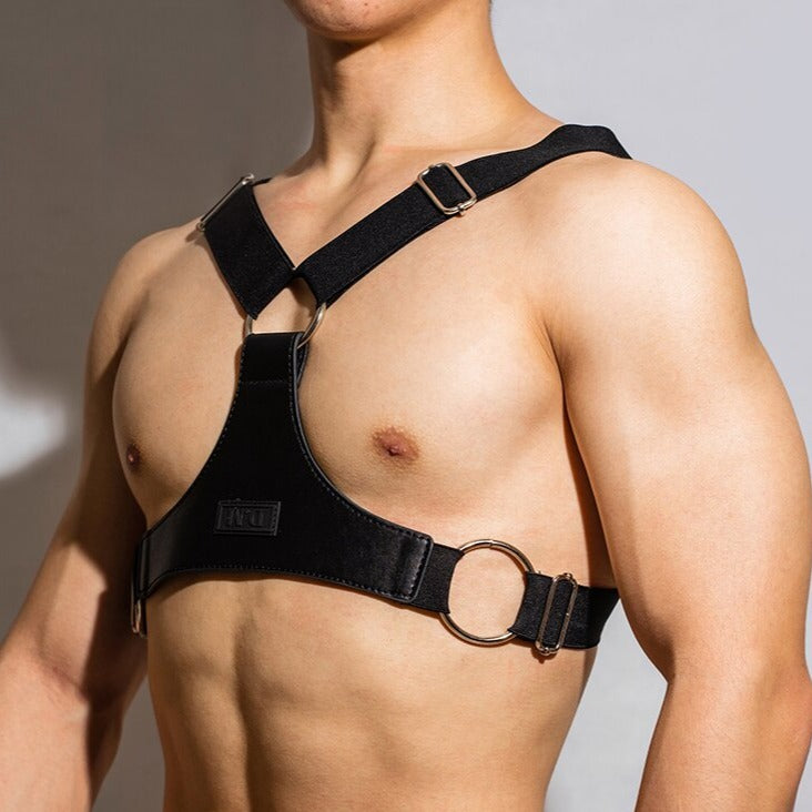 sexy gay man in Black Faux Leather Fetish Harness | Gay Harness- pridevoyageshop.com - gay men’s harness, lingerie and fetish wear