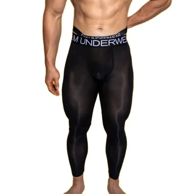 a hot man in black DM Nudism Tights - pridevoyageshop.com - gay men’s thights, leggings, and long underwear