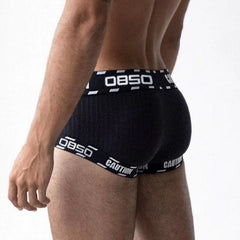 front of a man in black OBSO Men's Low Rise Boxer Briefs Underwear - pridevoyageshop.com - gay men’s underwear and swimwear