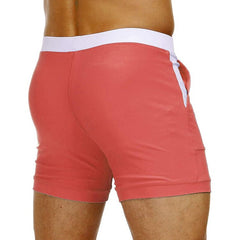 hot gay man in Watermelon Red Gay Swimwear & Beachwear | Drawstring Boxer Swim Trunks - pridevoyageshop.com - gay men’s underwear and swimwear