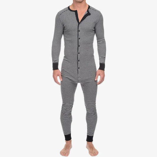 a hot daddy in gray All Night full-body men’s onesie - pridevoyageshop.com - men's pajamas, men's loungewear, men's sleepwear