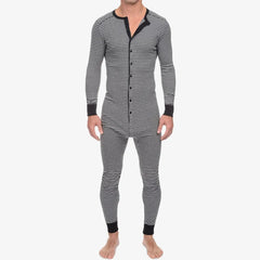 a hot daddy in gray All Night full-body men’s onesie - pridevoyageshop.com - men's pajamas, men's loungewear, men's sleepwear