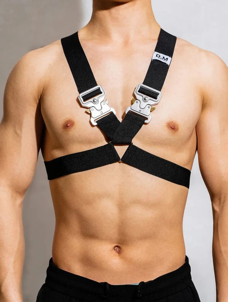 a sexy gay man in black DM Bound Buckle Chest Harness -pridevoyageshop.com - gay men’s harness, lingerie and fetish wear