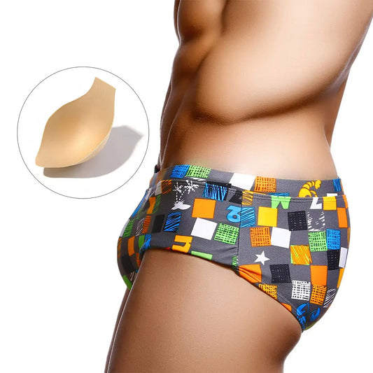 a hot gay man in Ocean Mosaic Swim Trunks - pridevoyageshop.com - gay men’s underwear and swimwear