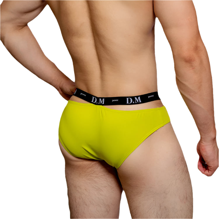 a hot man in Fluorescent Green DM Men’s Bulge-Boost Low-Rise Brief - pridevoyageshop.com - gay men’s thongs, boxers, briefs and jockstraps