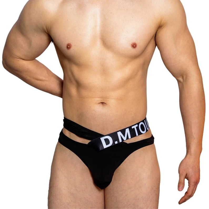 a hot man in black DM Touch Me Strap Thong - pridevoyageshop.com - gay men’s thongs, boxers, briefs and jockstraps