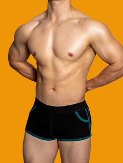 a sexy gay man in black DM Porn Star Pride Boxer Briefs - pridevoyageshop.com - gay men’s underwear and swimwear