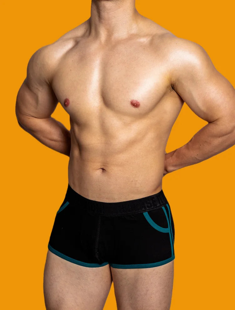 a sexy gay man in black DM Porn Star Pride Boxer Briefs - pridevoyageshop.com - gay men’s underwear and swimwear