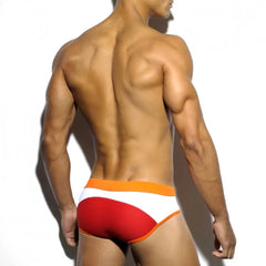 a hot gay man in red Men's Two-toned Bold Swim Briefs - pridevoyageshop.com - gay men’s underwear and swimwear