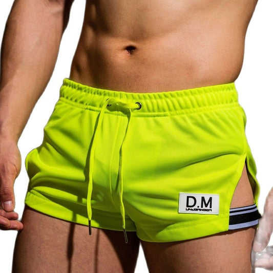 sexy gay man in Fluorescent Green Gay Shorts | DM Side Show Gym Shorts - Men's Activewear, gym short, sport shorts, running shorts- pridevoyageshop.com