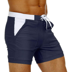 hot gay man in navy Gay Swimwear & Beachwear | Drawstring Boxer Swim Trunks - pridevoyageshop.com - gay men’s underwear and swimwear