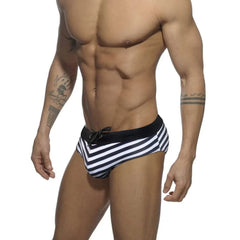 a hot gay man in black Sailor‘s Striped Bowtie Swim Briefs - pridevoyageshop.com - gay men’s underwear and swimwear