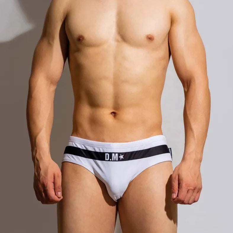 a hot gay man in black DM Gay Men's Position Swim Briefs - pridevoyageshop.com - gay men’s underwear and swimwear