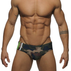 a sexy gay man in army green Men's Camo Swim Briefs - pridevoyageshop.com - gay men’s underwear and swimwear