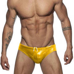 a hot gay man in yellow Glide Metallic Swim Briefs - pridevoyageshop.com - gay men’s underwear and swimwear