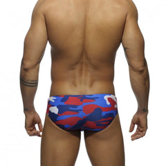 a sexy gay man in red Men's Camo Swim Briefs - pridevoyageshop.com - gay men’s underwear and swimwear