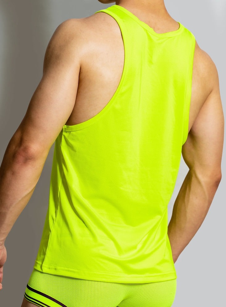 sexy gay man in Neon Green Gay Tops | DM Men's Mesh Muscle Tank Top - pridevoyageshop.com - gay men’s gym tank tops, mesh tank tops and activewear