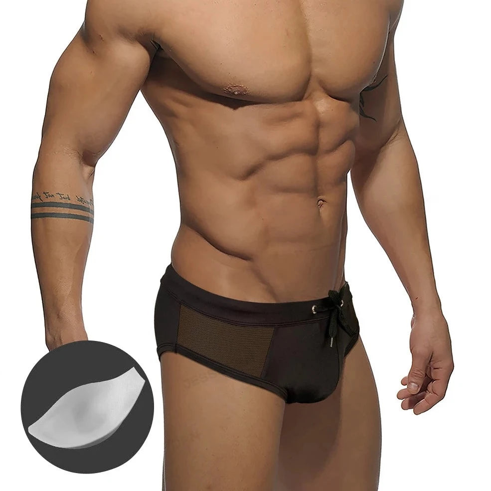 a sexy gay man in black Men's Sideshow Mesh Swim Briefs - pridevoyageshop.com - gay men’s underwear and swimwear