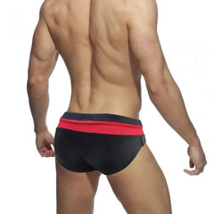 a sexy gay man in Black and Red Men's Bowtie Zippered Swim Briefs - pridevoyageshop.com - gay men’s underwear and swimwear