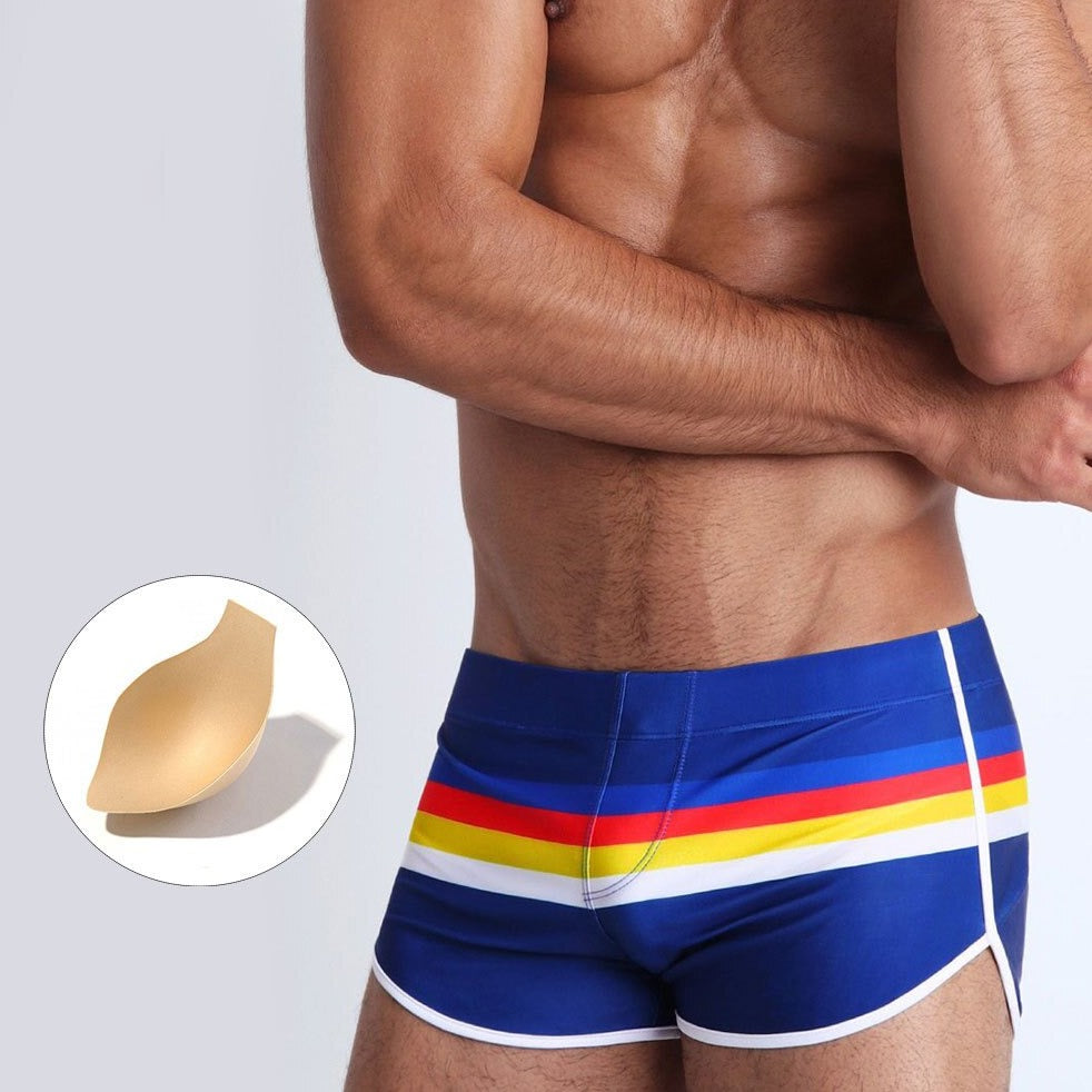 sexy gay man in dark blue Gay Swimwear & Beachwear | Men's Pride Stripe Swim Trunks - pridevoyageshop.com - gay men’s underwear and swimwear