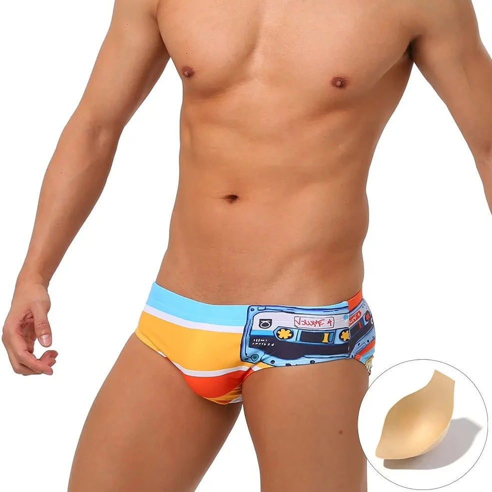 a hot gay man in Men's 80s Cassette Swim Briefs - pridevoyageshop.com - gay men’s underwear and swimwear