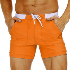 hot gay man in orange Gay Swimwear & Beachwear | Drawstring Boxer Swim Trunks - pridevoyageshop.com - gay men’s underwear and swimwear