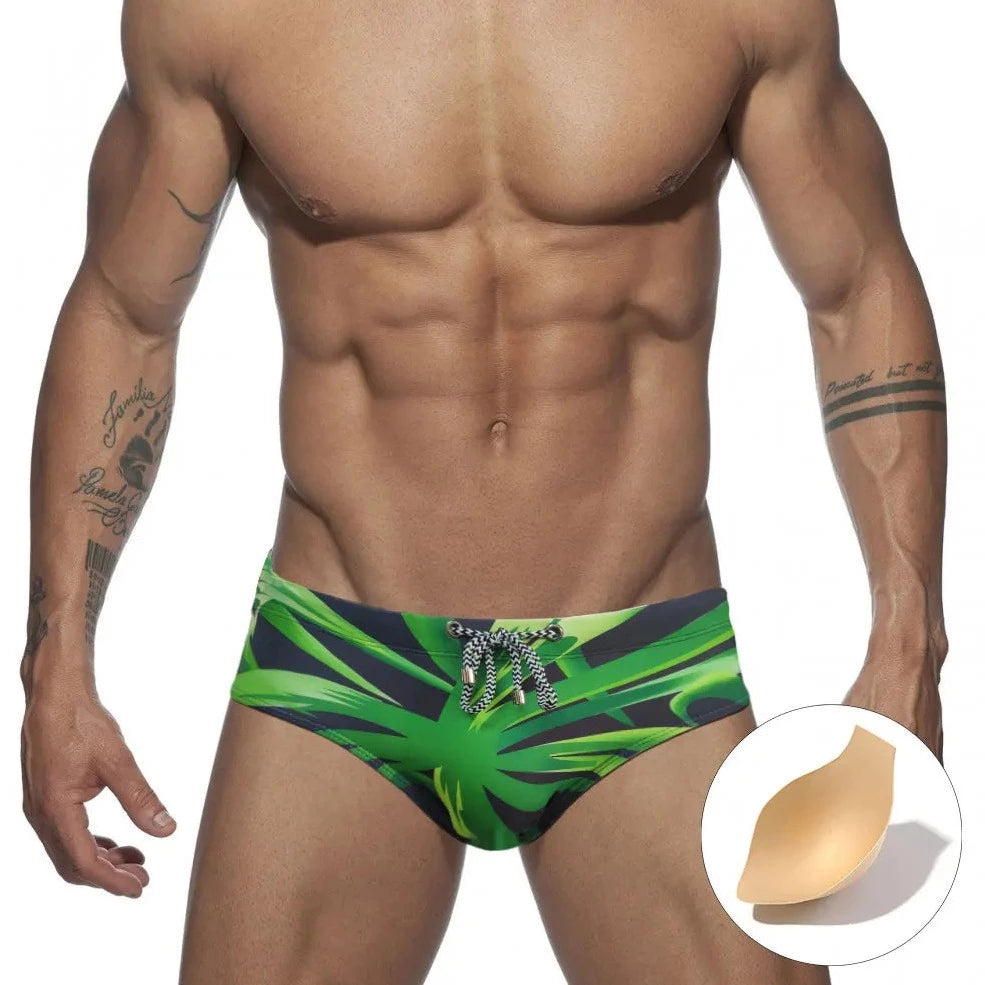 a hot gay man in Men's Green Leaf Swim Briefs - pridevoyageshop.com - gay men’s underwear and swimwear