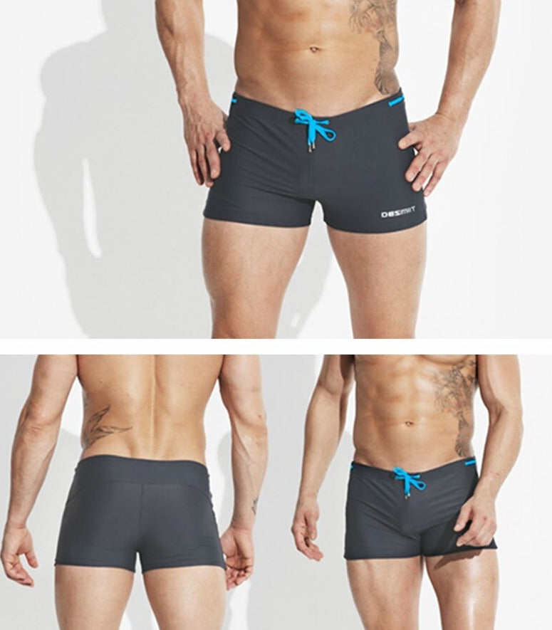 sexy gay man in dark gray Gay Swimwear | Sexy Mens Pouch Square Cut Swim Trunks - pridevoyageshop.com - gay men’s underwear and swimwear