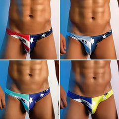 a hot gay man in DESMIIT Stars + Stripes Ultra Low Rise Swim Briefs - pridevoyageshop.com - gay men’s underwear and swimwear