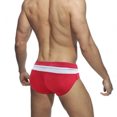 a sexy gay man in Red and White Men's Bowtie Zippered Swim Briefs - pridevoyageshop.com - gay men’s underwear and swimwear