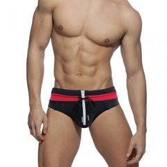 a sexy gay man in Black and Red Men's Bowtie Zippered Swim Briefs - pridevoyageshop.com - gay men’s underwear and swimwear