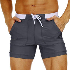 hot gay man in gray Gay Swimwear & Beachwear | Drawstring Boxer Swim Trunks - pridevoyageshop.com - gay men’s underwear and swimwear