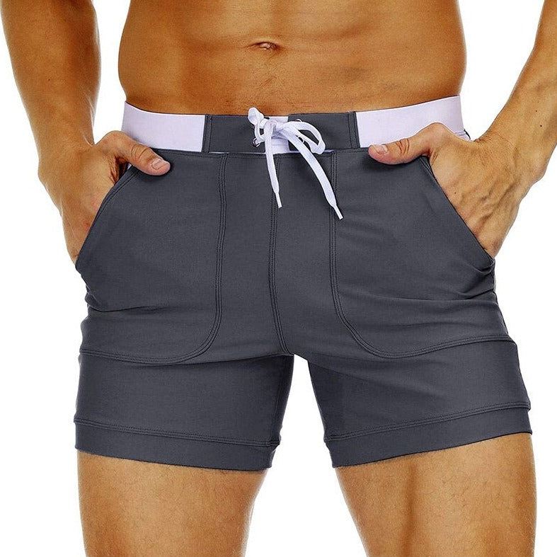 hot gay man in gray Gay Swimwear & Beachwear | Drawstring Boxer Swim Trunks - pridevoyageshop.com - gay men’s underwear and swimwear